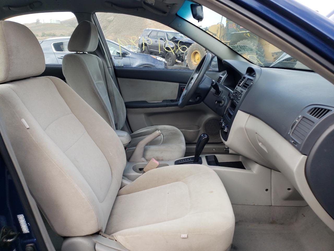 Photo 5 from auction – 2004 KIA SPECTRA LX with VIN KNAFE122645017861