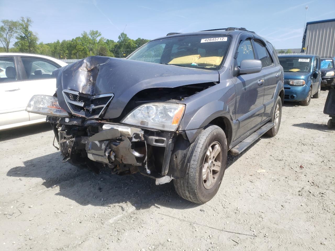 Photo 2 from auction – 2004 KIA SORENTO EX with VIN KNDJD733445308224