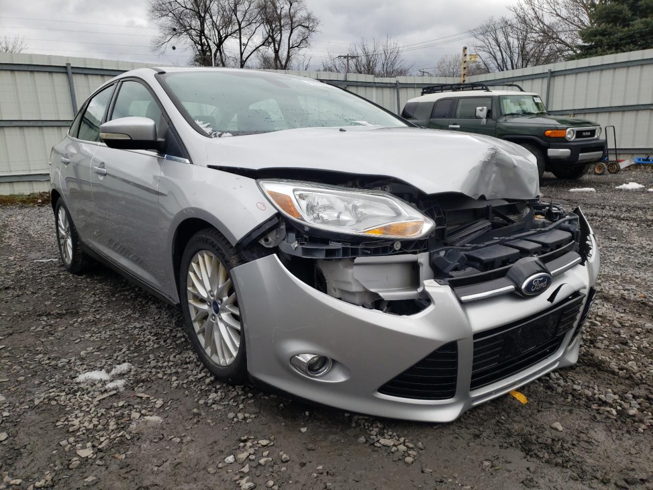 FORD FOCUS SEL 2012 with VIN 1FAHP3H2XCL442394 - Photo from auction
