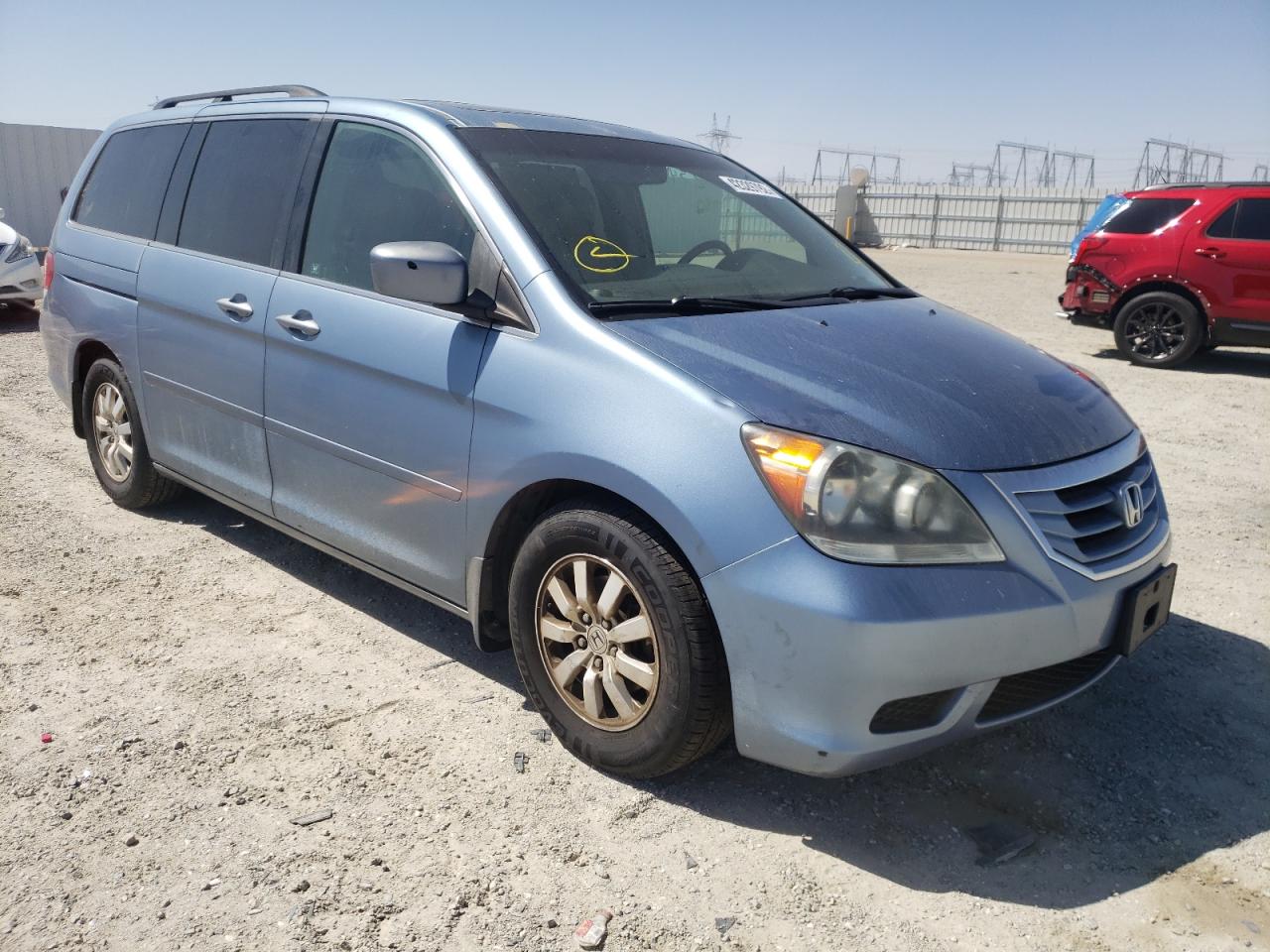 HONDA ODYSSEY 2010 with VIN 5FNRL3H67AB080635 - Photo from auction