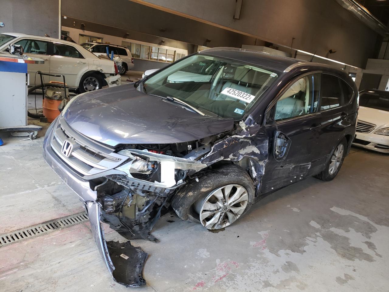 Photo 2 from auction – 2013 HONDA CR-V EXL with VIN 2HKRM4H71DH610325