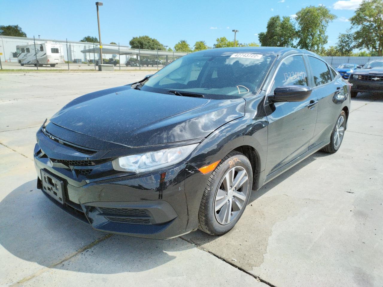 Photo 2 from auction – 2017 HONDA CIVIC LX with VIN 19XFC2F5XHE206817
