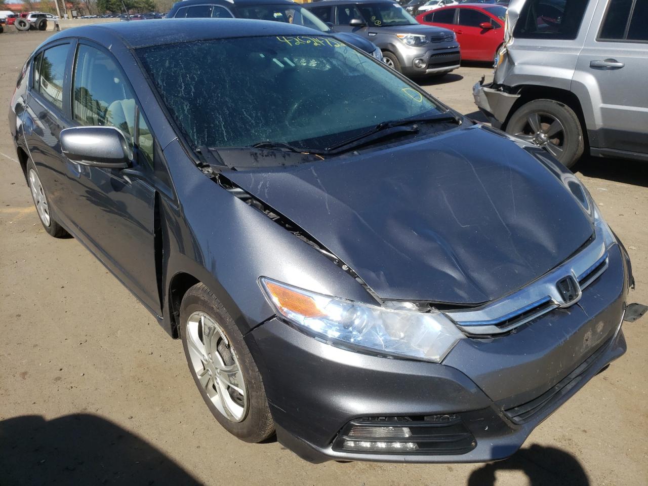 HONDA INSIGHT 2014 with VIN JHMZE2H34ES000306 - Photo from auction