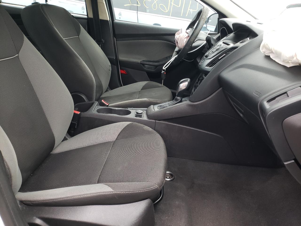 Photo 5 from auction – 2014 FORD FOCUS S with VIN 1FADP3E22EL256046