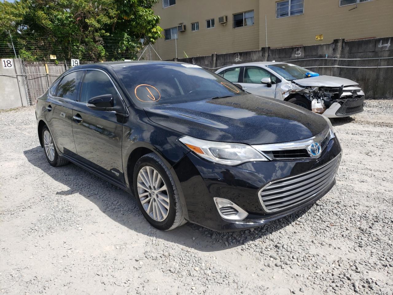 TOYOTA AVALON HYB 2015 with VIN 4T1BD1EB6FU038665 - Photo from auction