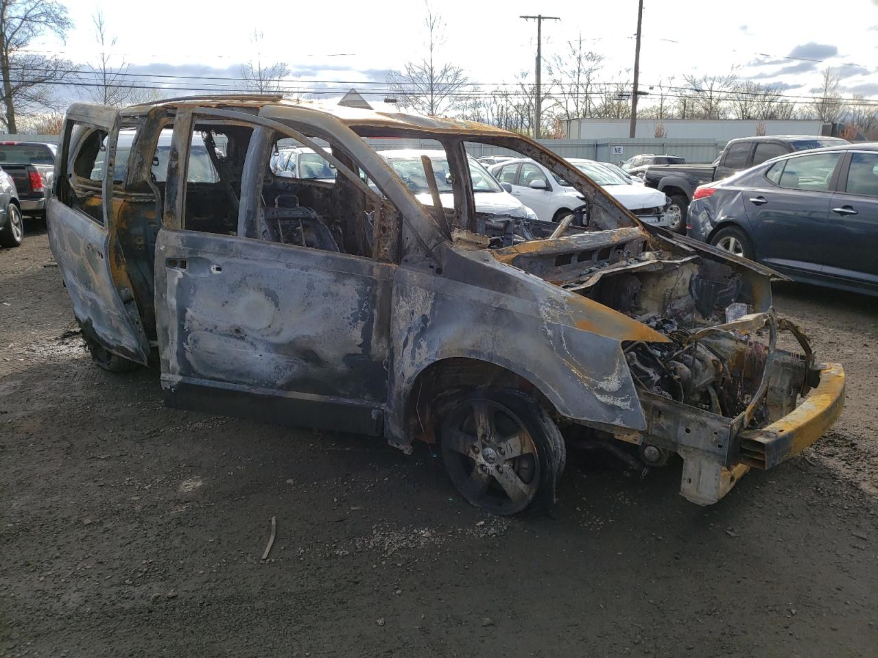 DODGE GRAND CARA 2010 with VIN 2D4RN5D11AR467303 - Photo from auction