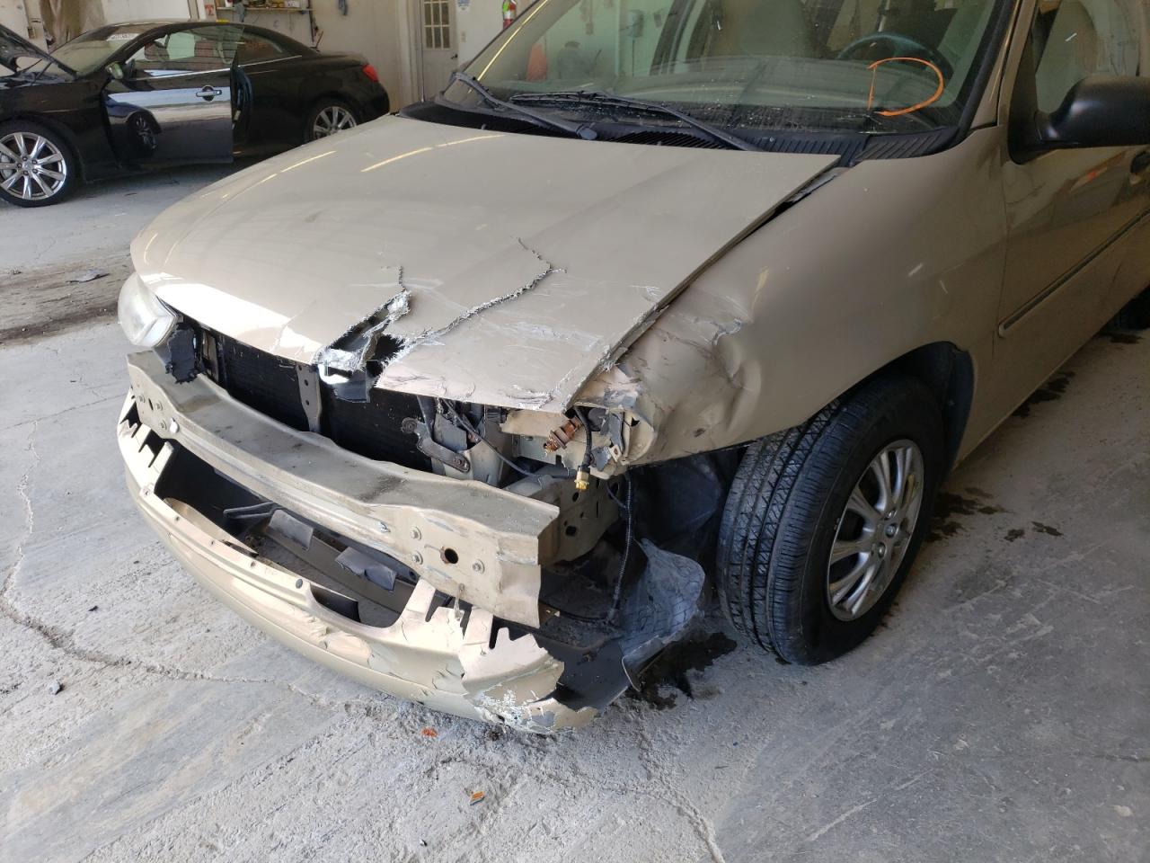 Фото 9 с аукциона – 1998 FORD WINDSTAR W с VIN 2FMDA5141WBB04187