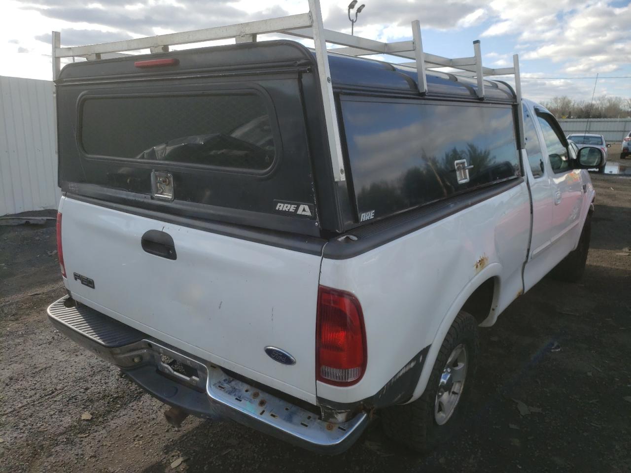 Photo 4 from auction – 2003 FORD F150 with VIN 2FTRX18WX3CA35014