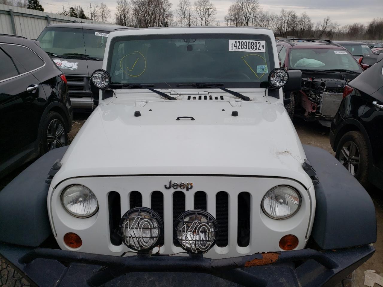 Photo 9 from auction – 2013 JEEP WRANGLER U with VIN 1C4BJWDG6DL654232