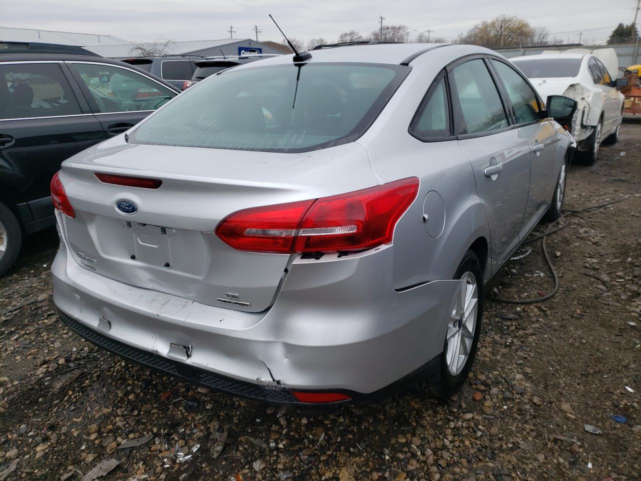 Photo 4 from auction – 2016 FORD FOCUS SE with VIN 1FADP3F25GL293240