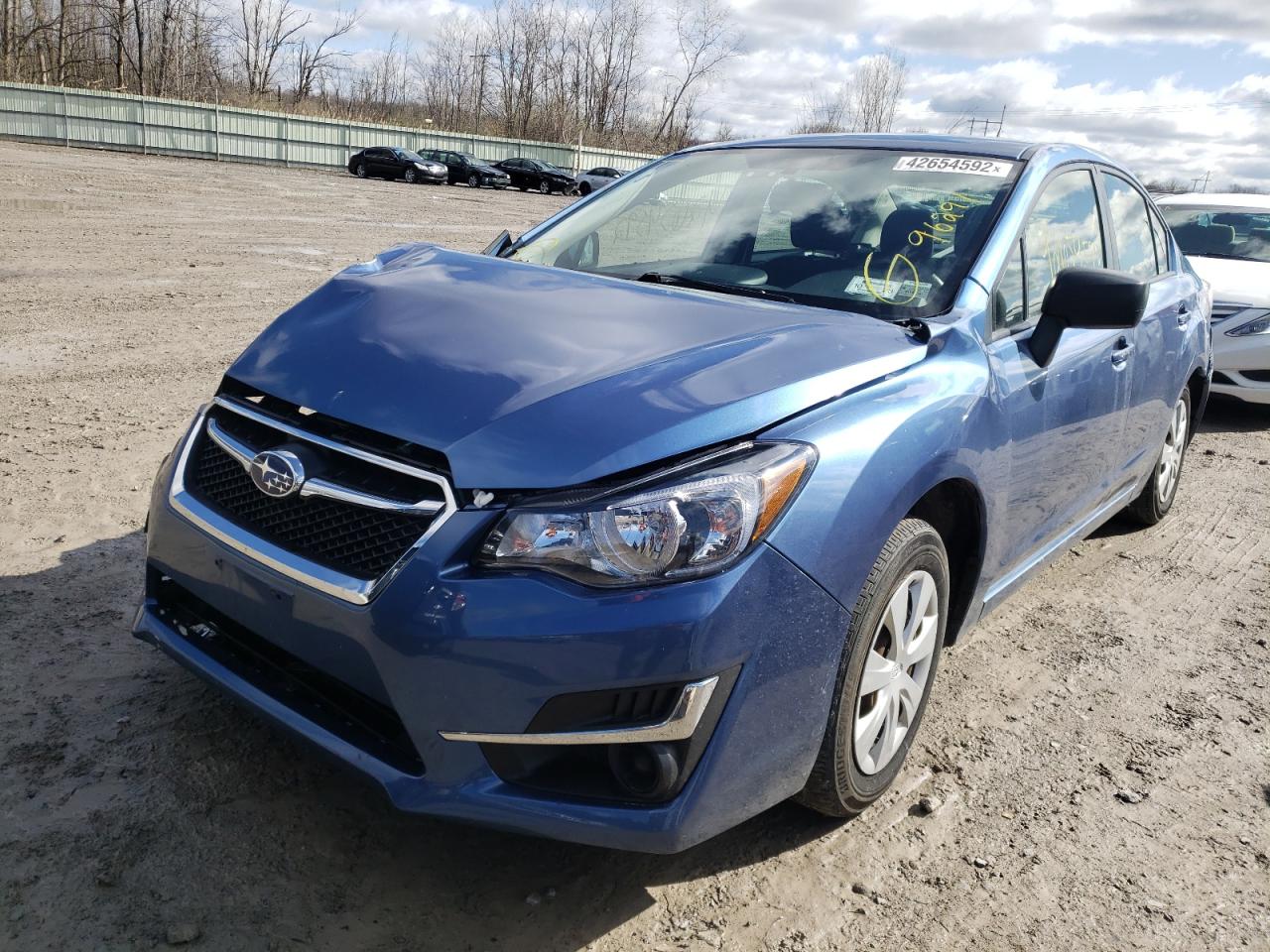 Photo 2 from auction – 2016 SUBARU IMPREZA with VIN JF1GJAA66GH002972