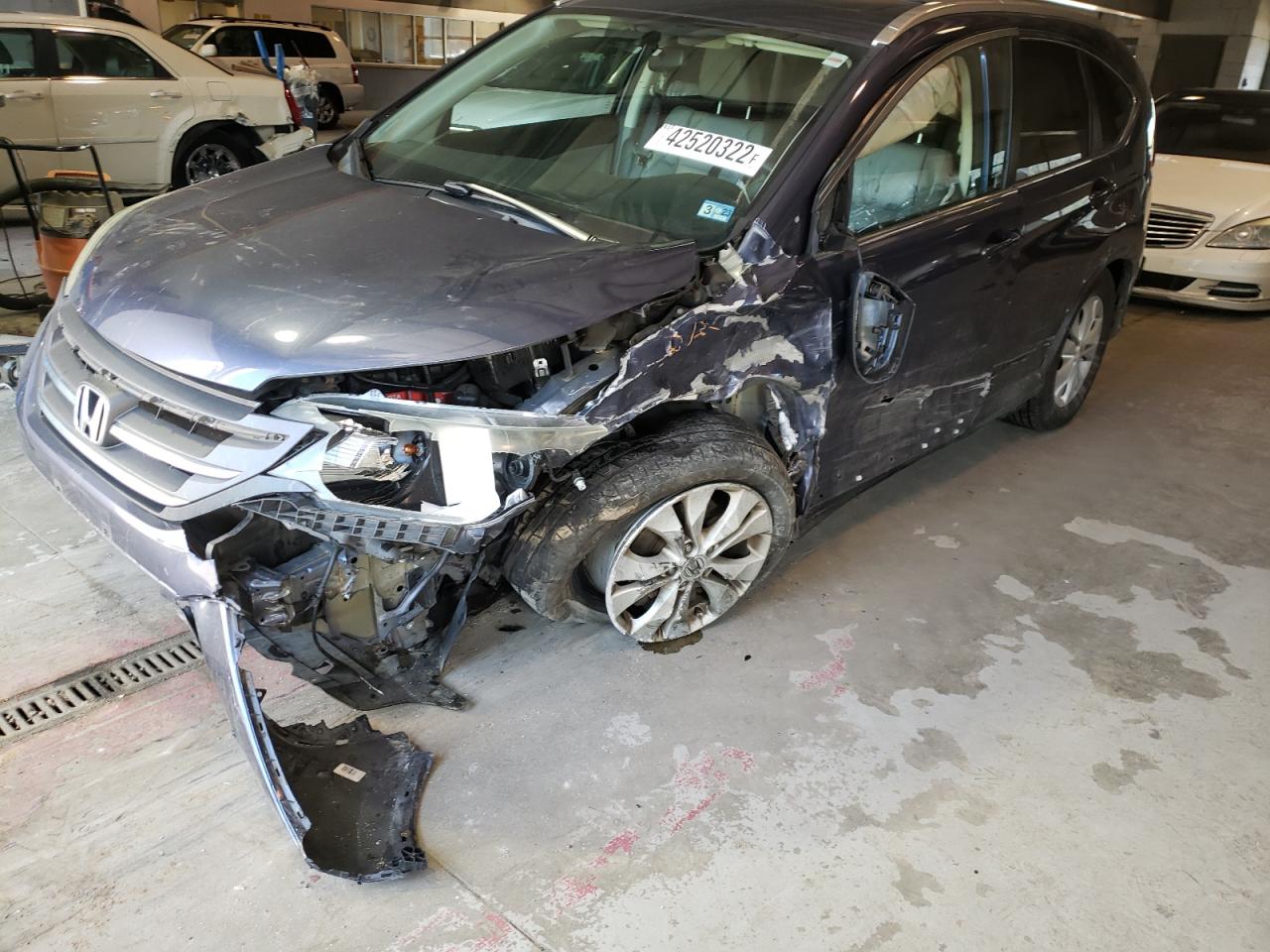 Photo 9 from auction – 2013 HONDA CR-V EXL with VIN 2HKRM4H71DH610325