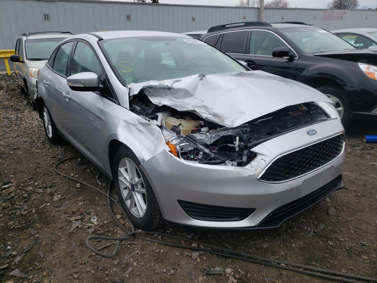 FORD FOCUS SE 2016 with VIN 1FADP3F25GL293240 - Photo from auction