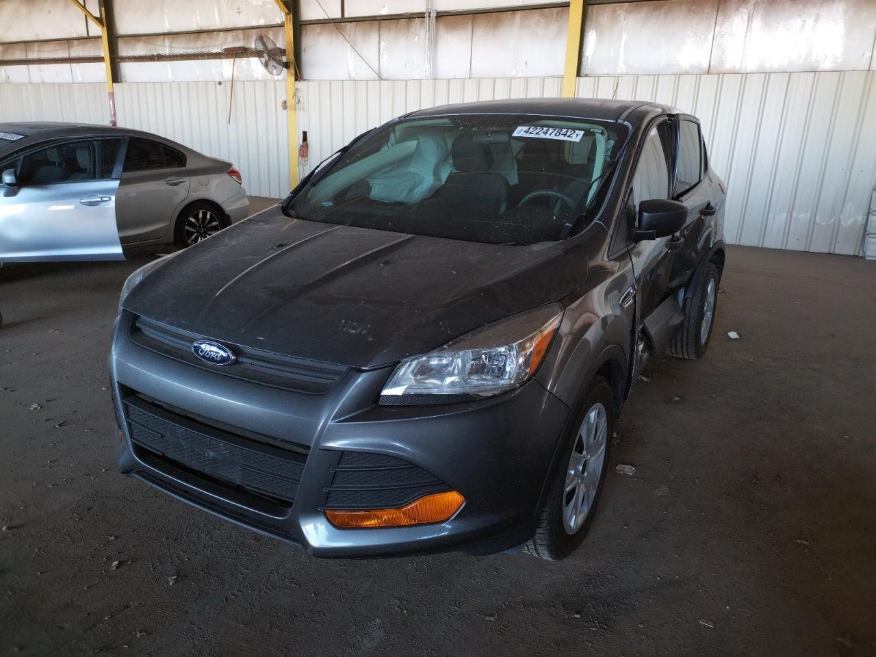 Photo 2 from auction – 2014 FORD ESCAPE S with VIN 1FMCU0F75EUC67460