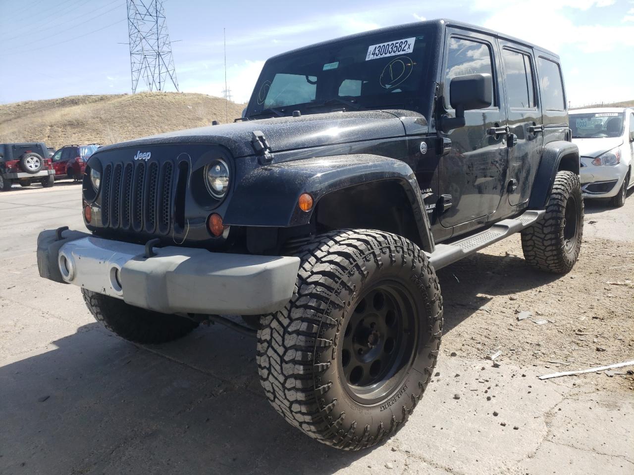 Photo 2 from auction – 2011 JEEP WRANGLER U with VIN 1J4HA5H12BL563296