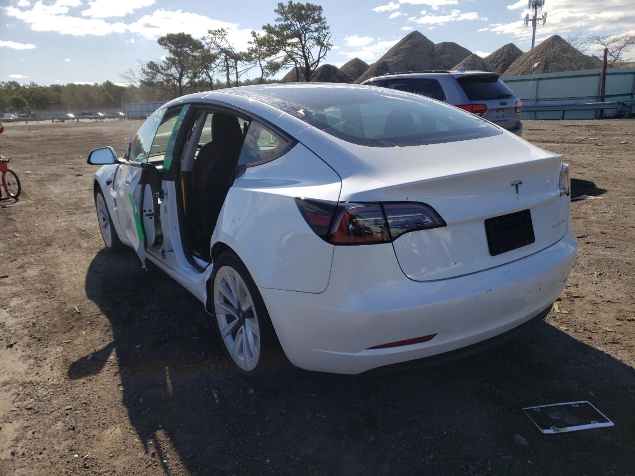 Photo 3 from auction – 2021 TESLA MODEL 3 with VIN 5YJ3E1EB4MF030141