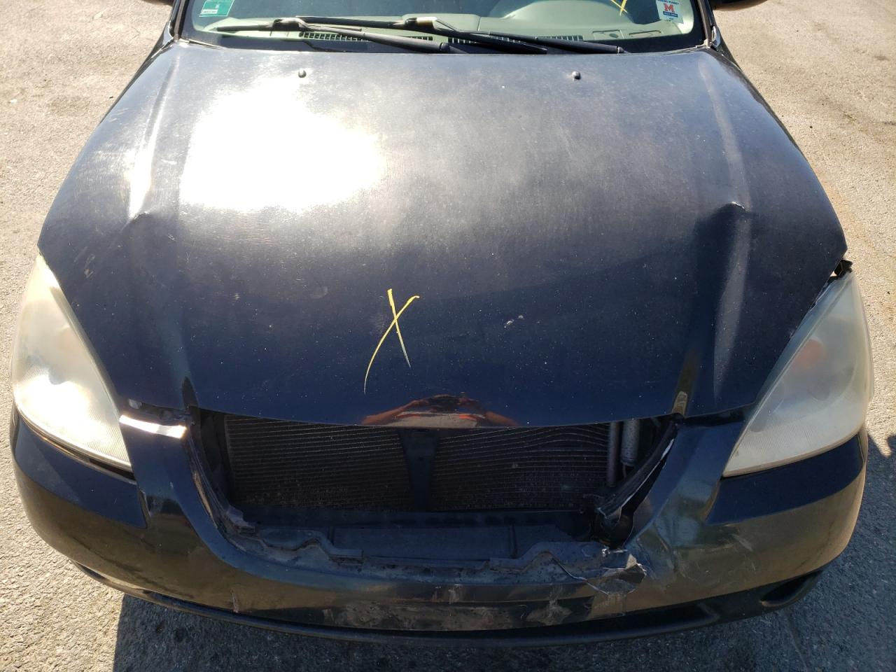 Photo 7 from auction – 2002 NISSAN ALTIMA BAS with VIN 1N4AL11E82C243221