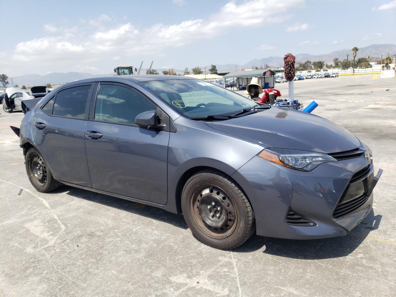 TOYOTA COROLLA L 2019 with VIN 5YFBURHE4KP948718 - Photo from auction