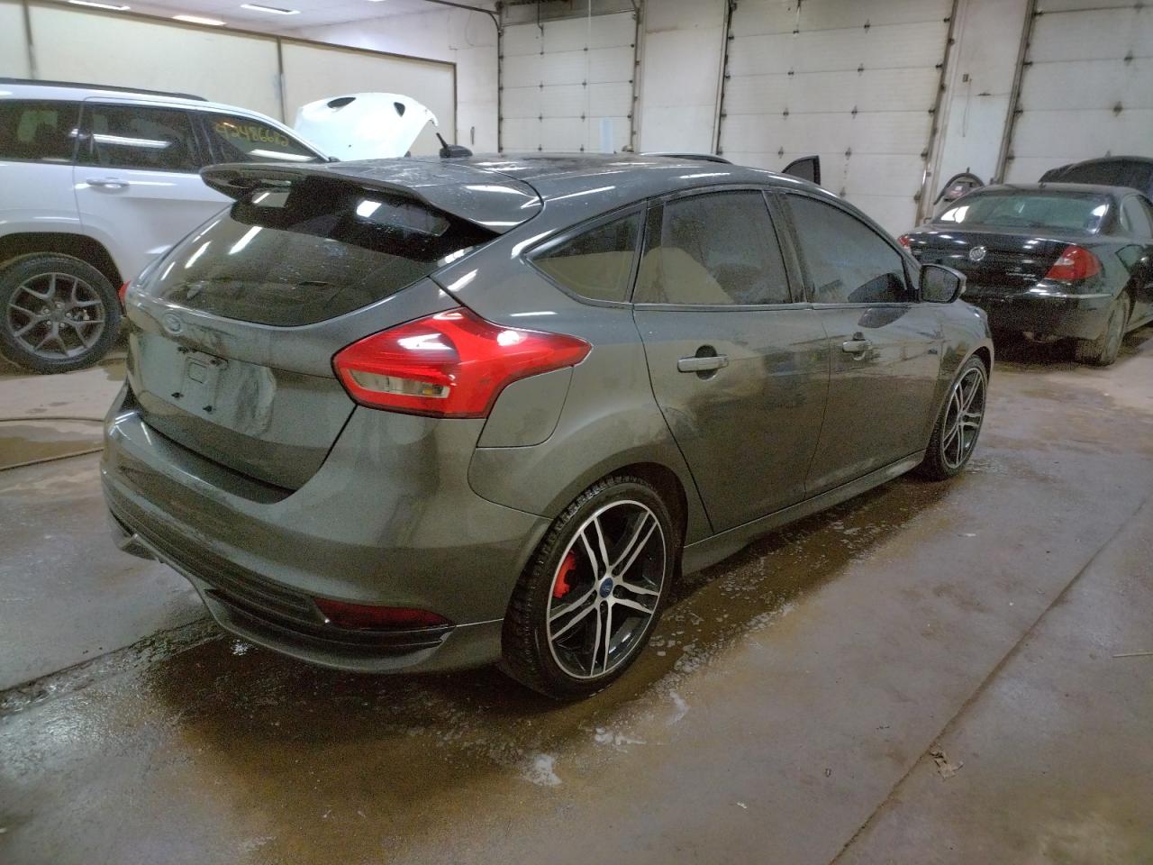 Photo 4 from auction – 2017 FORD FOCUS ST with VIN 1FADP3L90HL328253