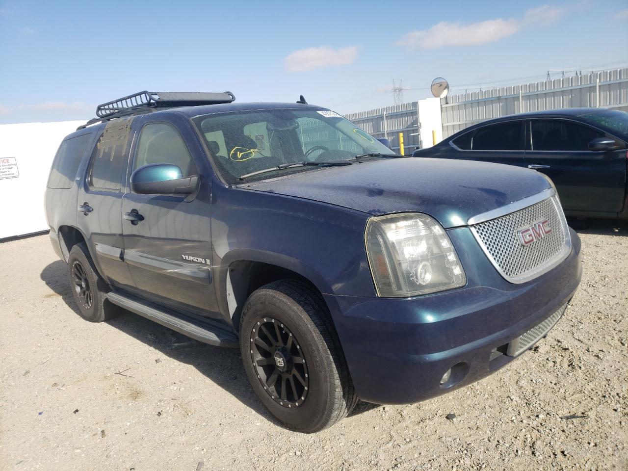 GMC YUKON 2007 with VIN 1GKFK130X7J237707 - Photo from auction