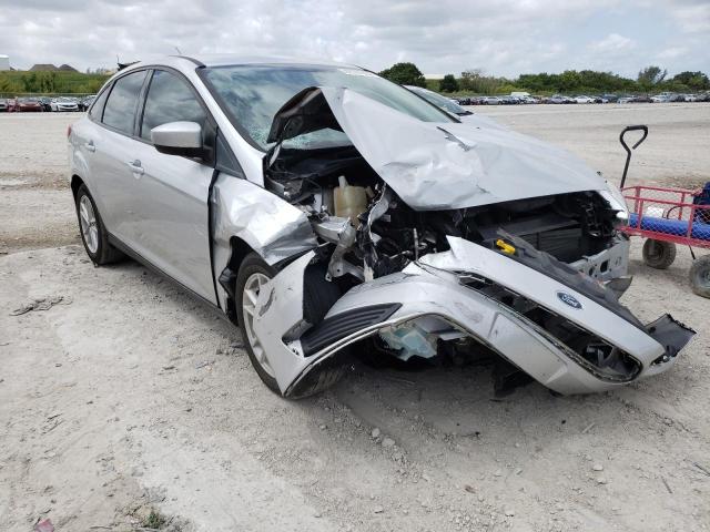 FORD FOCUS SE 2018 with VIN 1FADP3F28JL234559 - Photo from auction