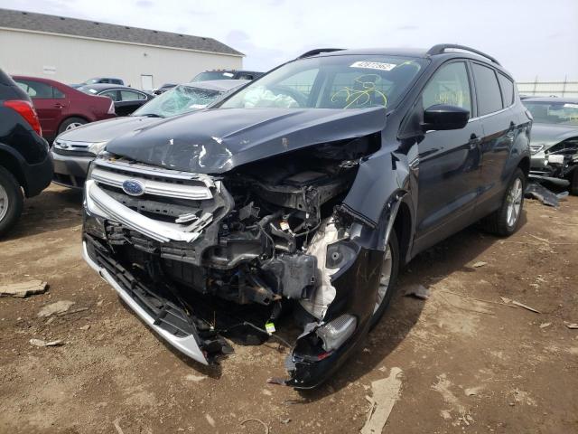 Photo 2 from auction – 2018 FORD ESCAPE SEL with VIN 1FMCU9HD8JUD49023