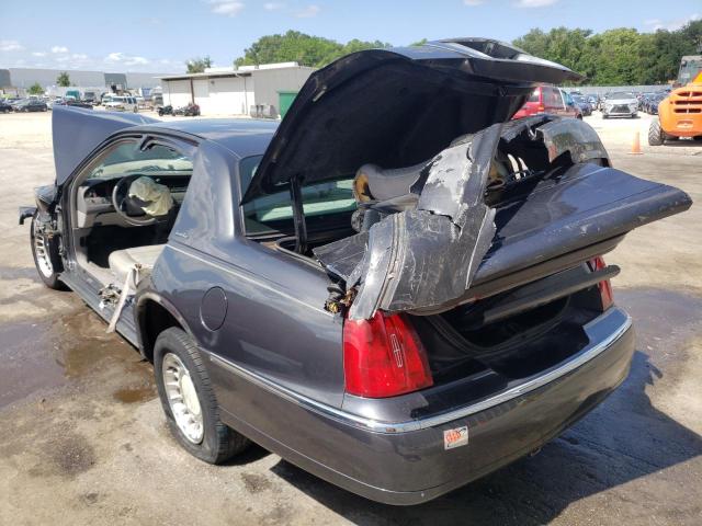 Photo 3 from auction – 2002 LINCOLN TOWN CAR E with VIN 1LNHM81W82Y640319
