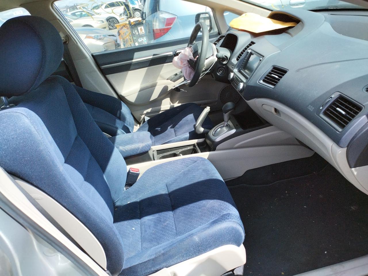 Photo 5 from auction – 2006 HONDA CIVIC HYBR with VIN JHMFA362X6S005574