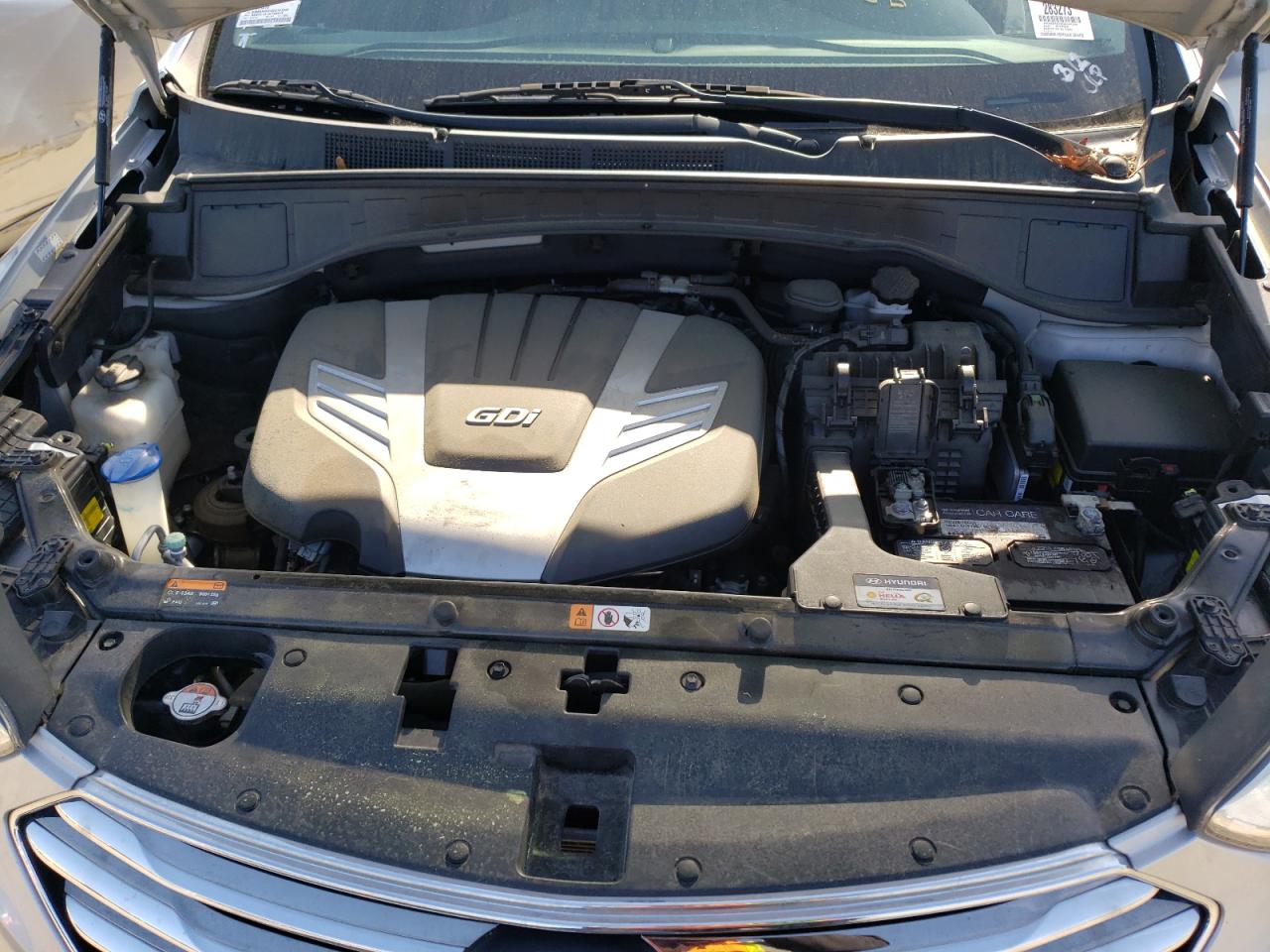 Photo 7 from auction – 2016 HYUNDAI SANTA FE S with VIN KM8SR4HF0GU141244