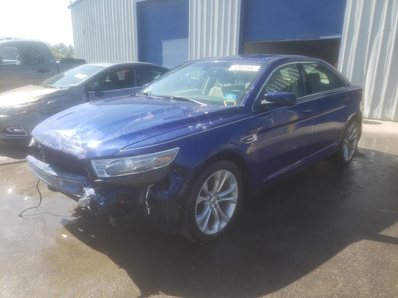 Photo 2 from auction – 2013 FORD TAURUS SEL with VIN 1FAHP2E82DG115209