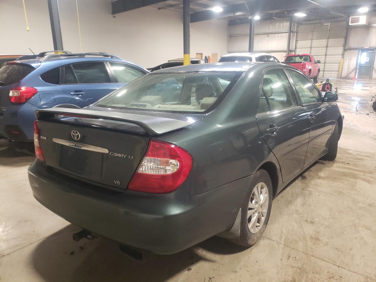 Photo 4 from auction – 2004 TOYOTA CAMRY LE with VIN 4T1BF30K34U075280