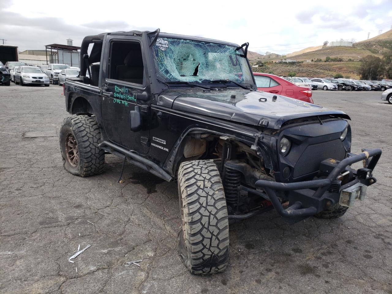 JEEP WRANGLER S 2011 with VIN 1J4AA2D17BL528341 - Photo from auction