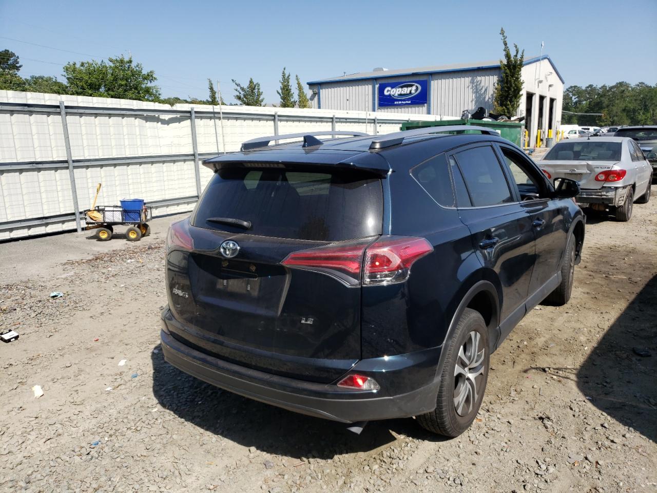 Photo 4 from auction – 2018 TOYOTA RAV4 LE with VIN JTMZFREV1JJ172001