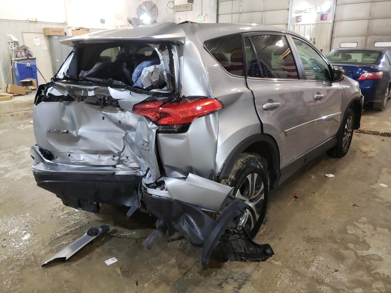 Photo 4 from auction – 2018 TOYOTA RAV4 LE with VIN 2T3BFREV2JW842013