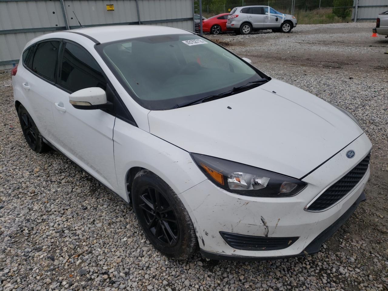 FORD FOCUS SE 2015 with VIN 1FADP3K20FL301751 - Photo from auction