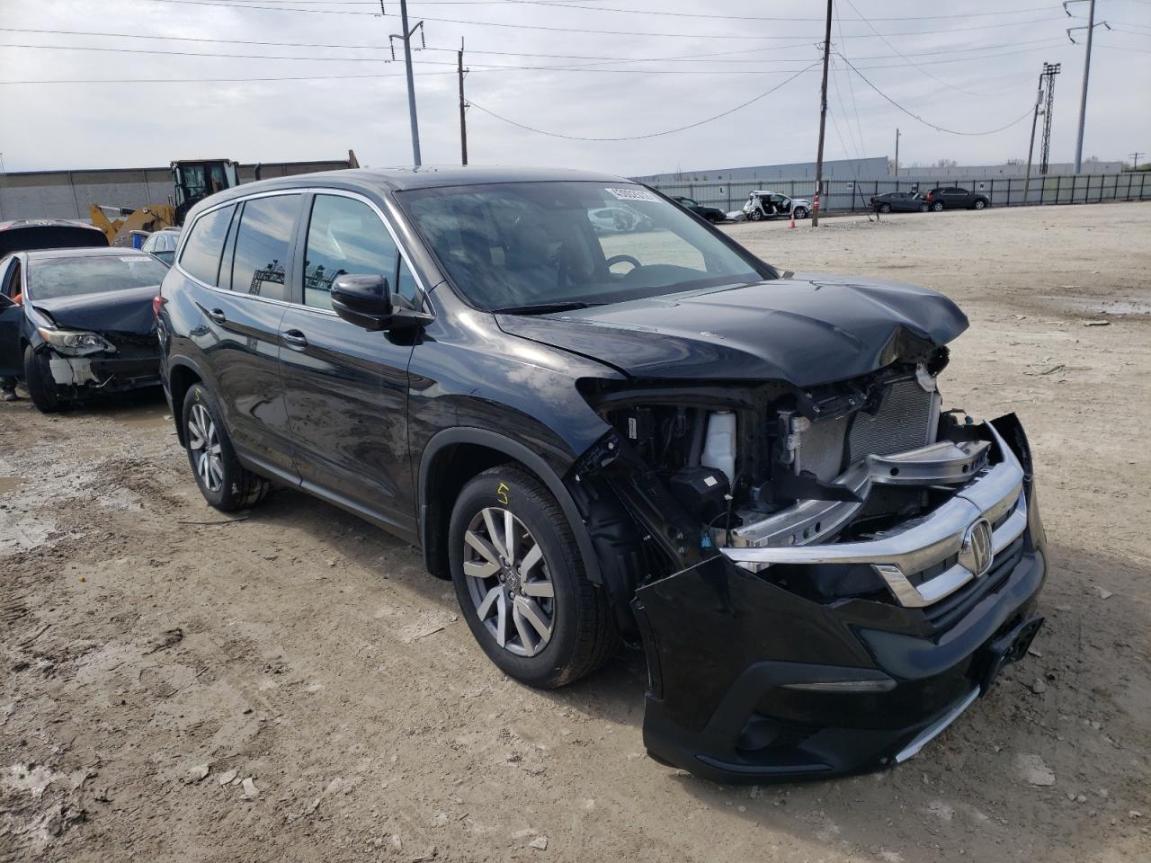 HONDA PILOT EXL 2019 with VIN 5FNYF6H54KB040882 - Photo from auction