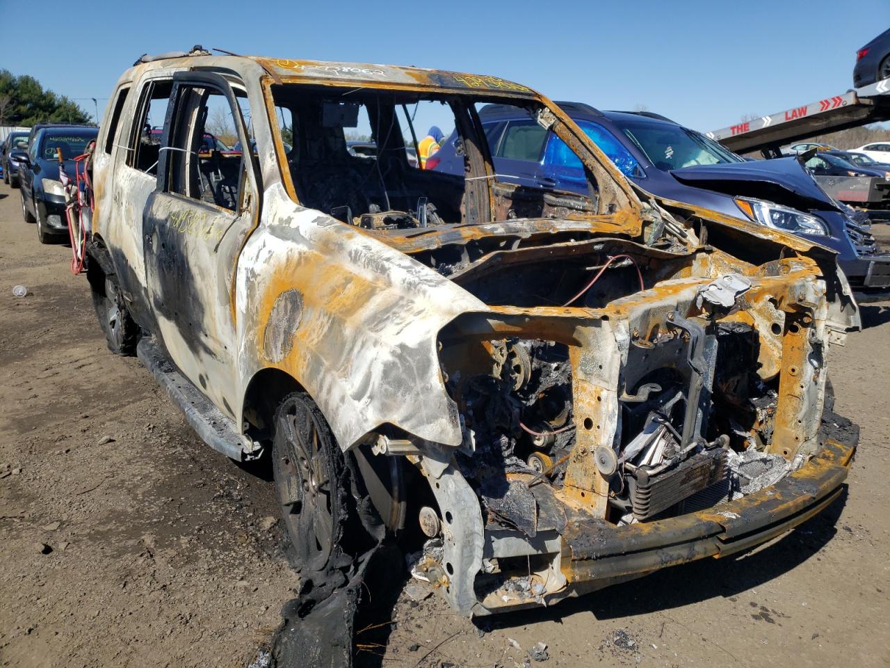 HONDA PILOT TOUR 2012 with VIN 5FNYF4H92CB011065 - Photo from auction