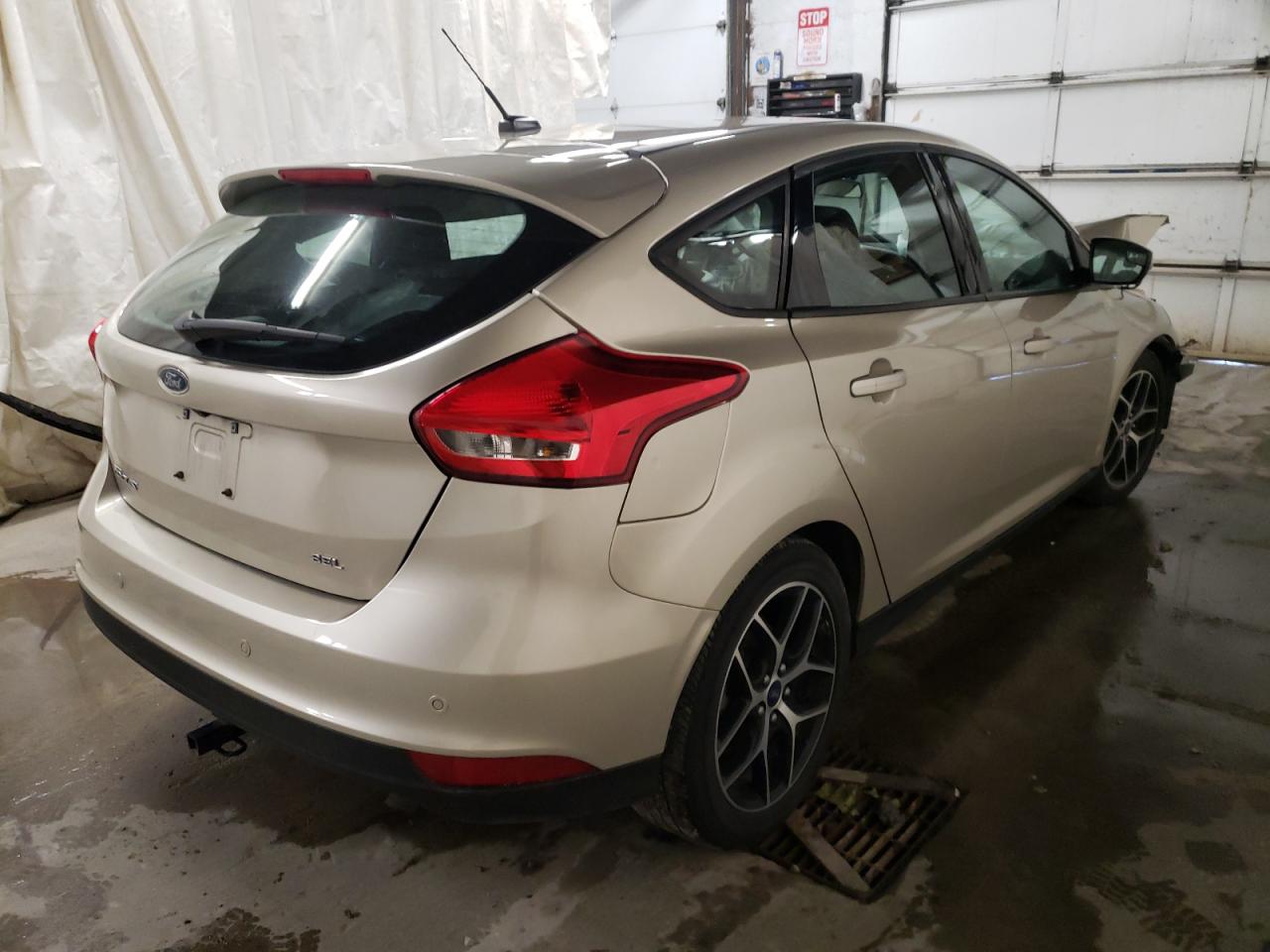 Photo 4 from auction – 2017 FORD FOCUS SEL with VIN 1FADP3M23HL213907