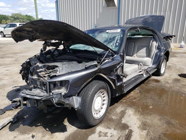 Photo 2 from auction – 2002 LINCOLN TOWN CAR E with VIN 1LNHM81W82Y640319