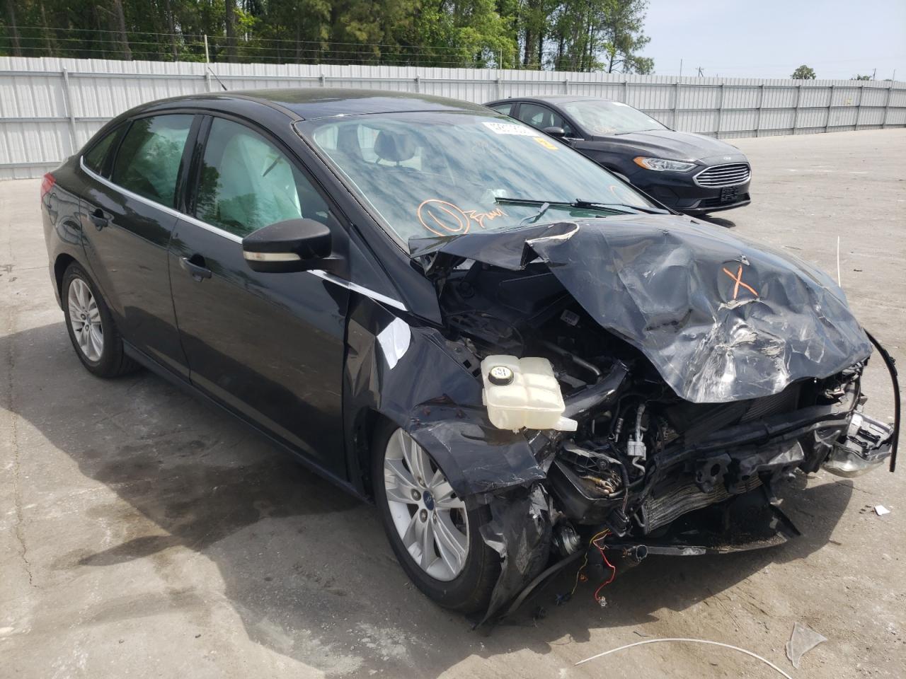 FORD FOCUS SEL 2012 с VIN 1FAHP3H20CL358097 - Фото с аукциона
