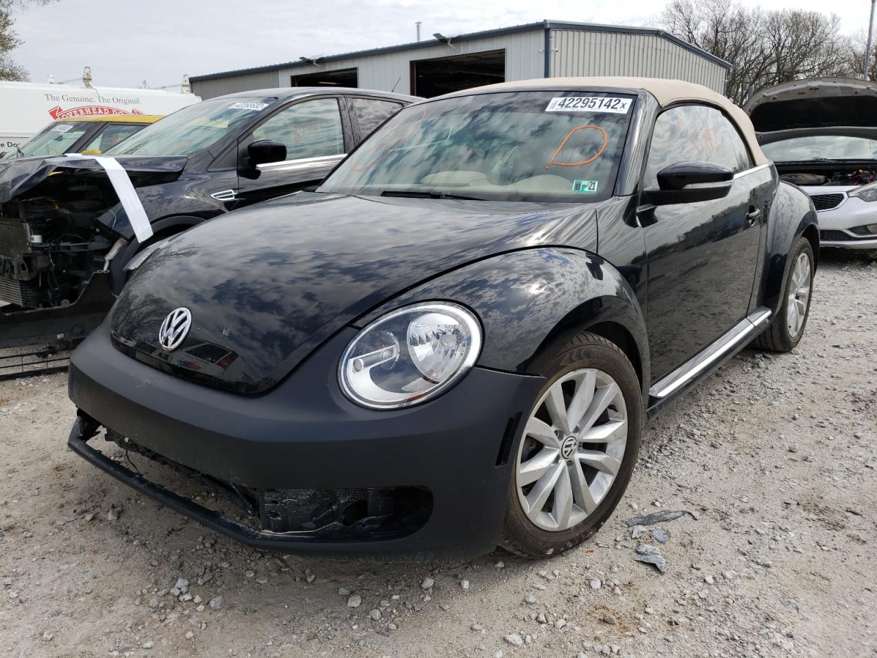 Photo 2 from auction – 2013 VOLKSWAGEN BEETLE with VIN 3VW5L7AT8DM831504