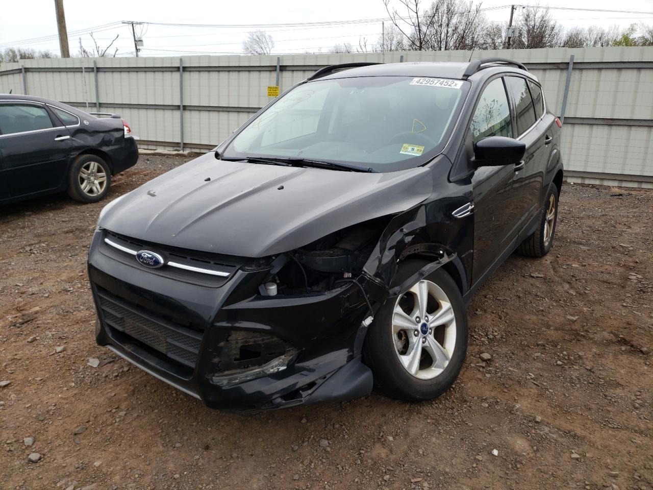 Photo 2 from auction – 2014 FORD ESCAPE SE with VIN 1FMCU9G9XEUE45481