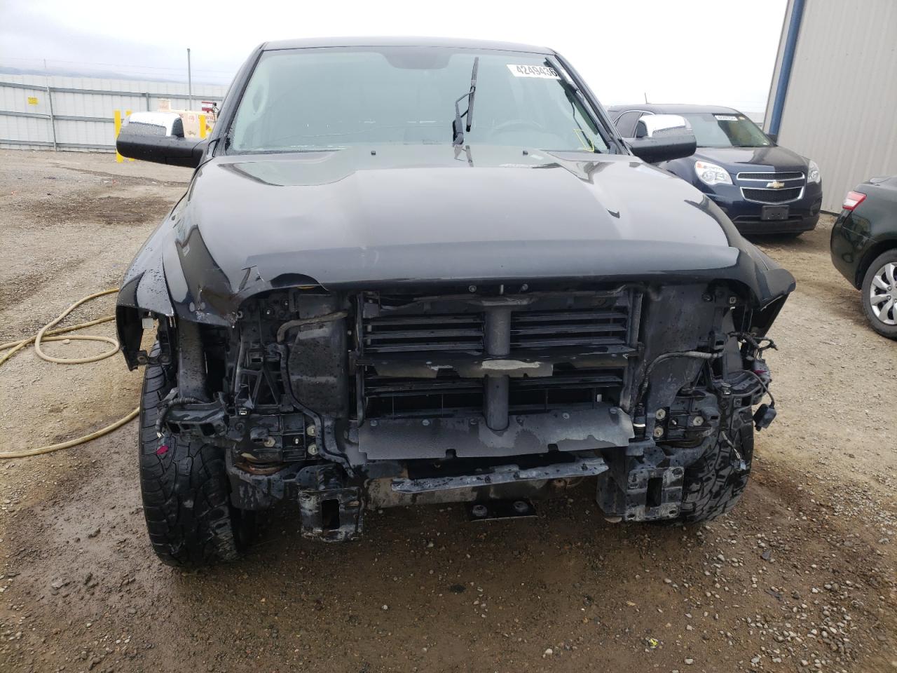 Photo 9 from auction – 2014 RAM 1500 LONGH with VIN 1C6RR7PT5ES294701