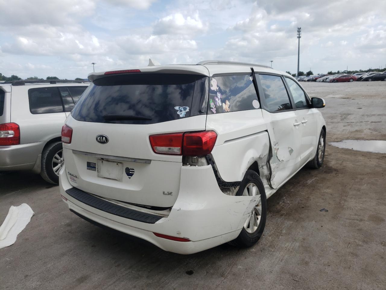 Photo 4 from auction – 2015 KIA SEDONA LX with VIN KNDMB5C13F6076329