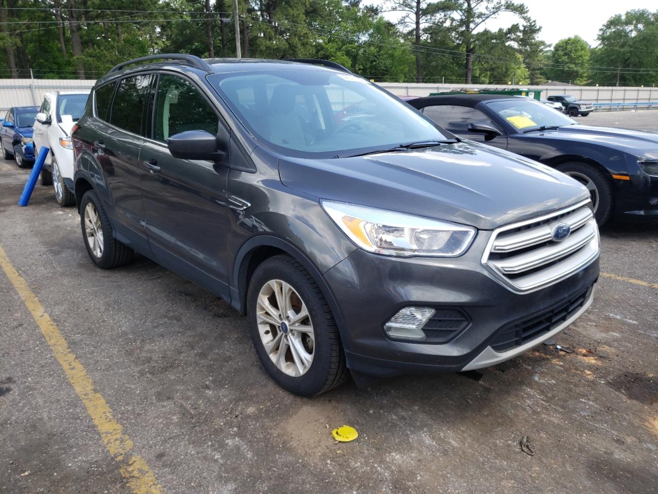 FORD ESCAPE SE 2018 with VIN 1FMCU0GD9JUC87354 - Photo from auction