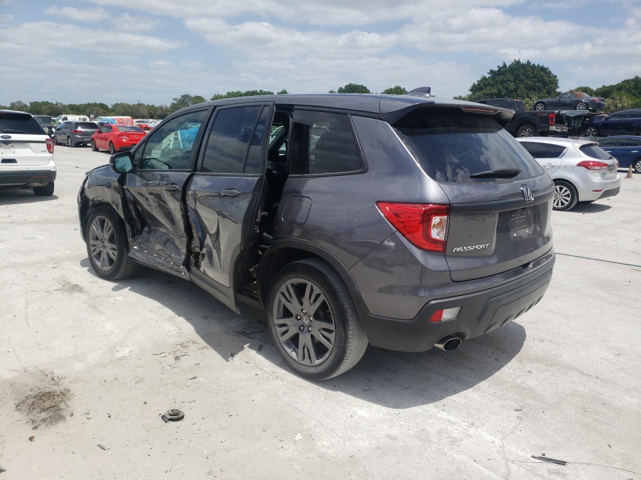 Photo 3 from auction – 2020 HONDA PASSPORT E with VIN 5FNYF7H50LB001987