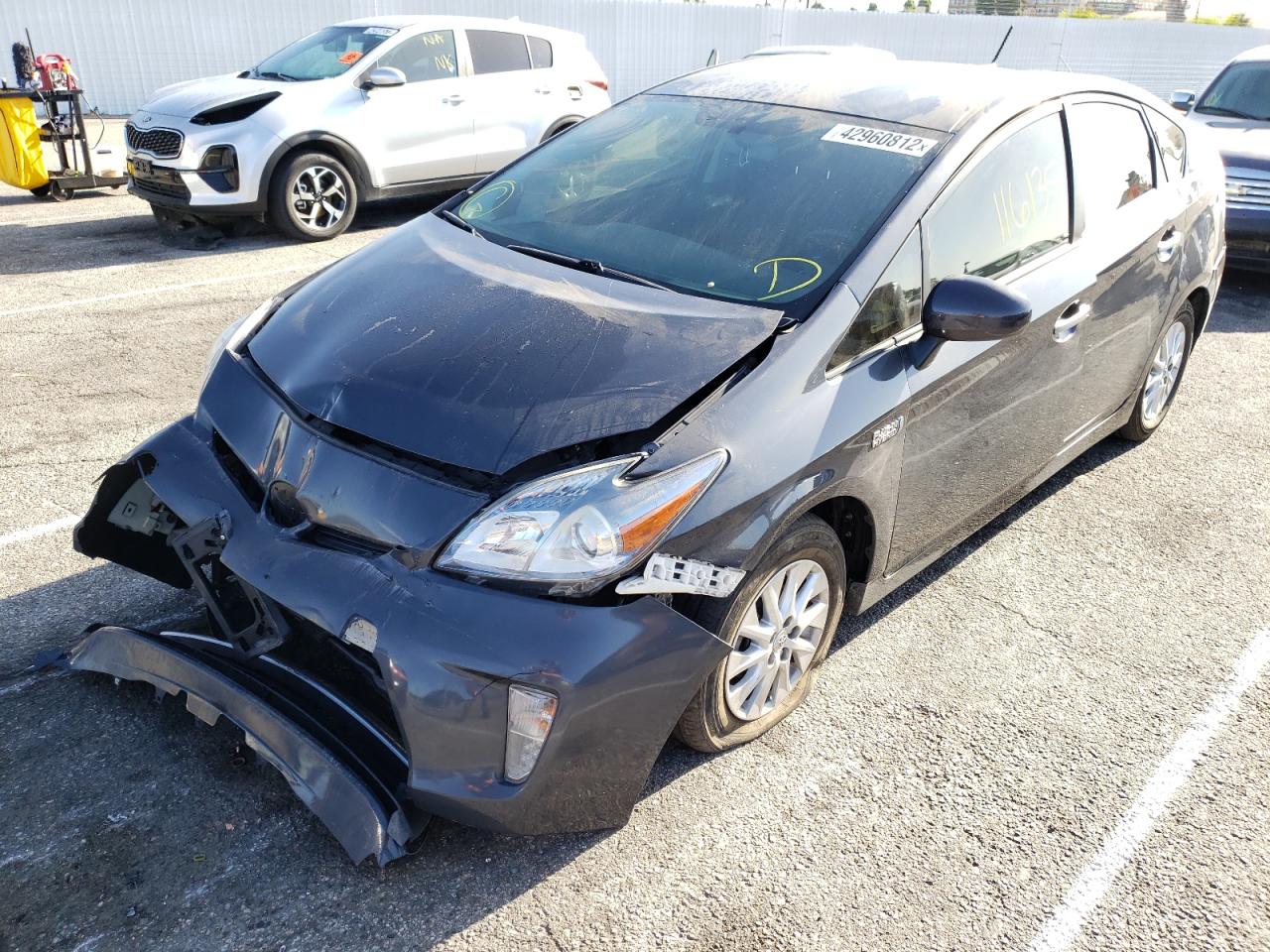 Photo 2 from auction – 2014 TOYOTA PRIUS PLUG with VIN JTDKN3DPXE3061428