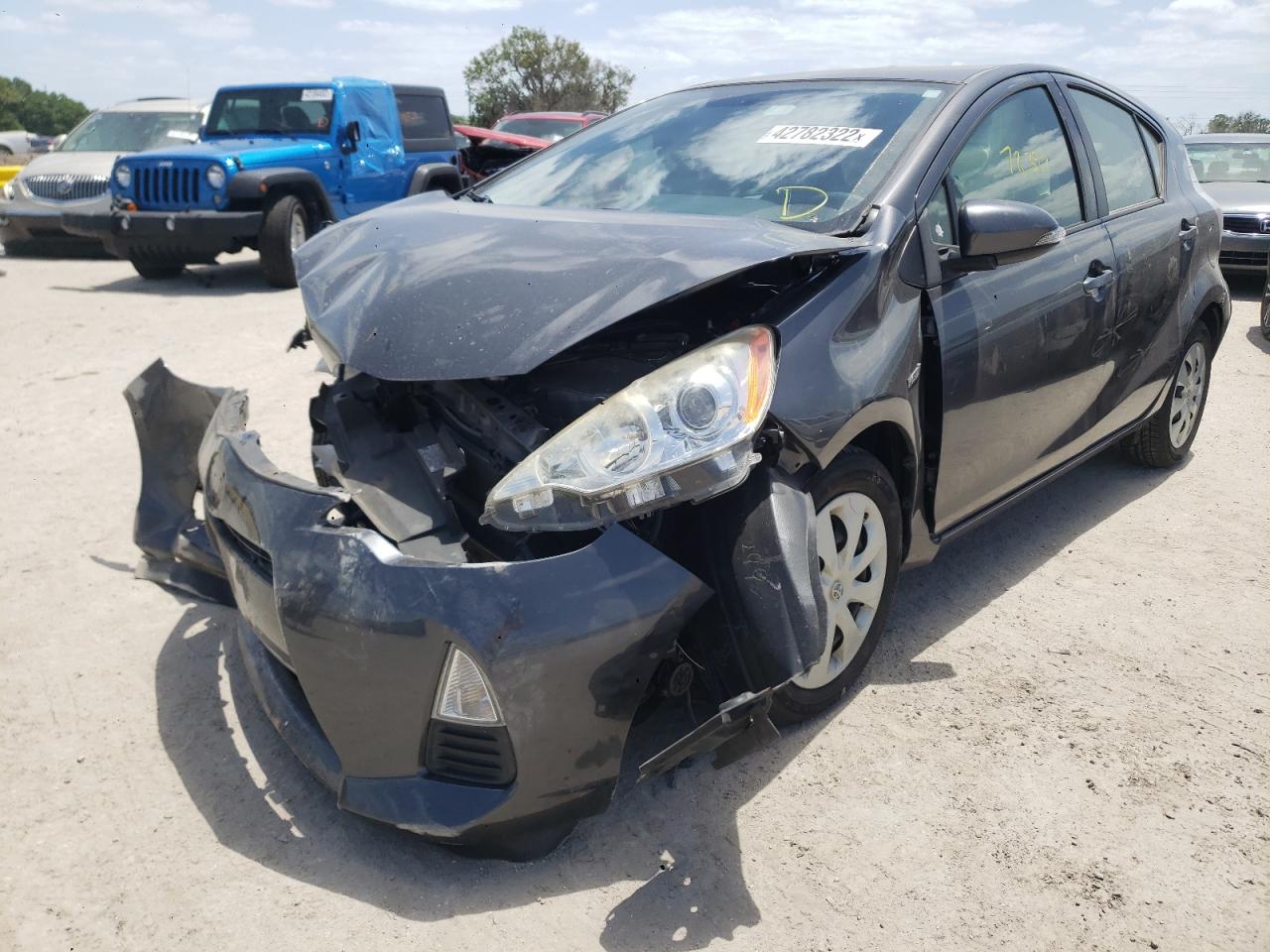 Photo 2 from auction – 2014 TOYOTA PRIUS C with VIN JTDKDTB38E1566933
