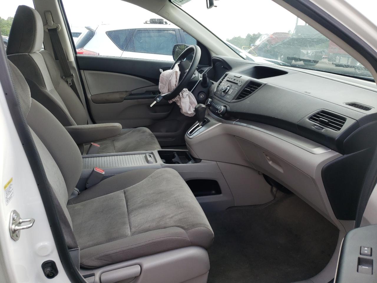Photo 5 from auction – 2014 HONDA CR-V LX with VIN 5J6RM3H31EL034704