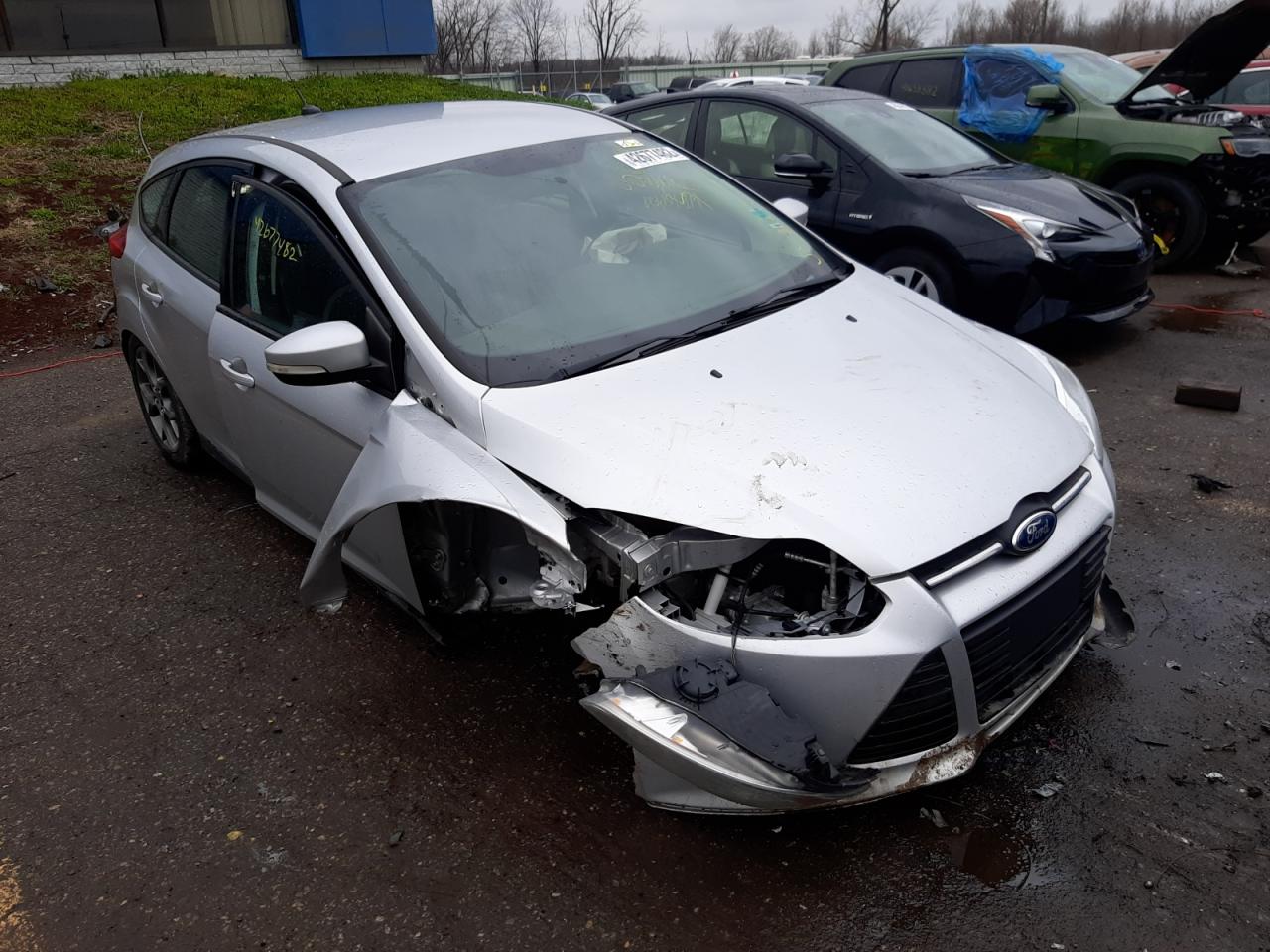 FORD FOCUS SE 2014 with VIN 1FADP3K26EL137243 - Photo from auction